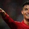 Cristiano Ronaldo a sorrir e a apontar